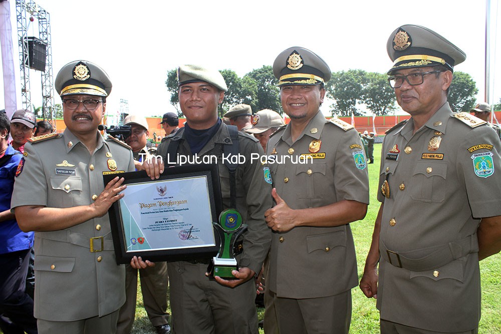 RIBUAN SATPOL PP JAWA TIMUR RAYAKAN HUT KE 67 DAN LINMAS KE 55 DI KABUPATEN PASURUAN